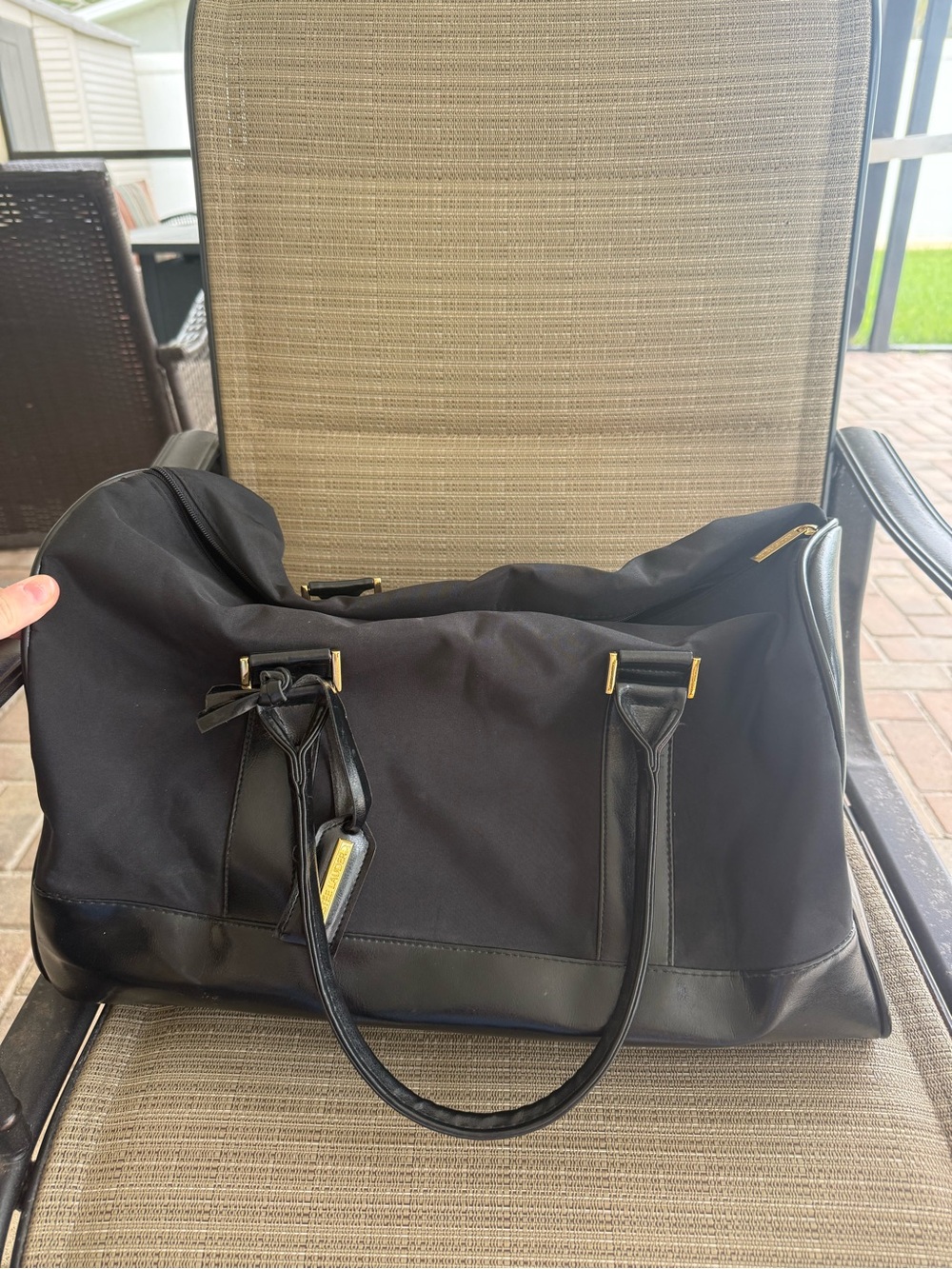 Estee Lauder black weeekender travel tote bag with Leather Trim and Gold Accent